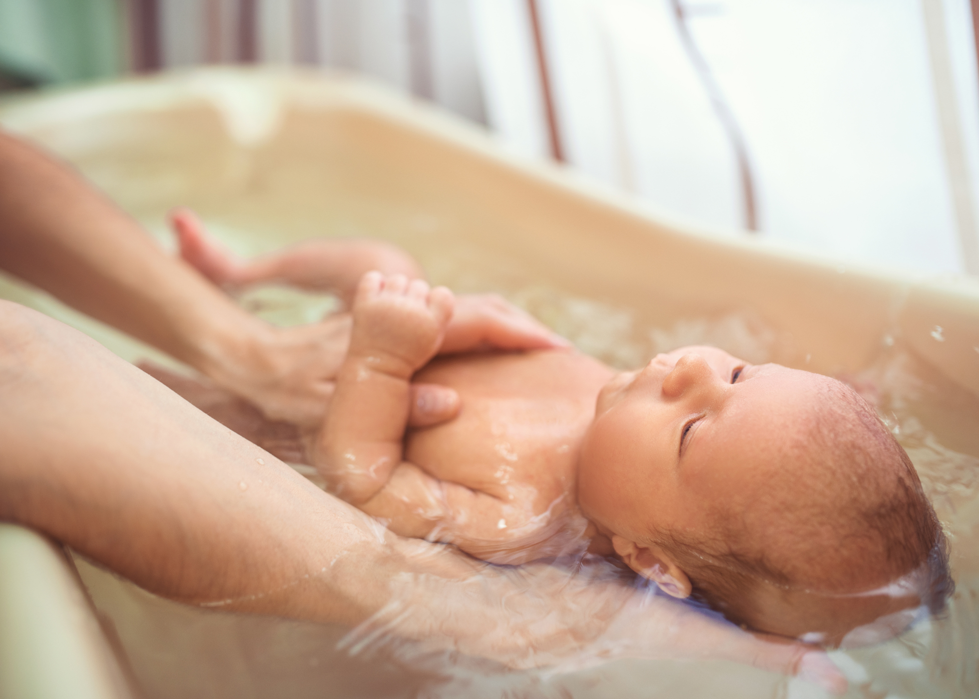 Bagnetto neonato più Lezione Immagine del servizio Bagnetto neonato con lezione